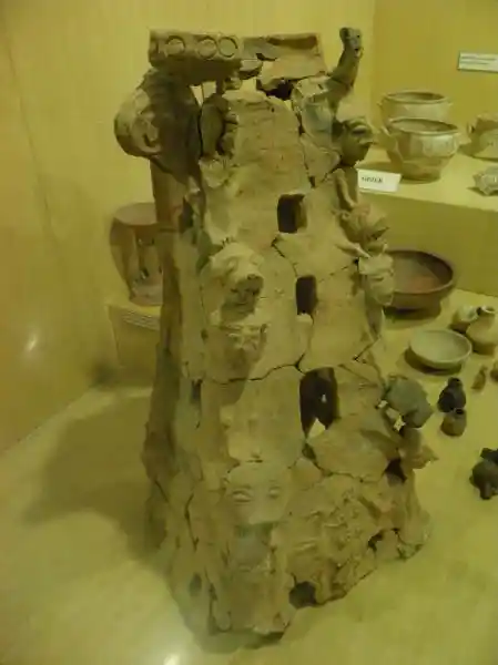 Pyramid-shaped Caanite ritual item with heads of sphinx and lions Pyramid-shaped Caanite ritual item with heads of sphinx and lions